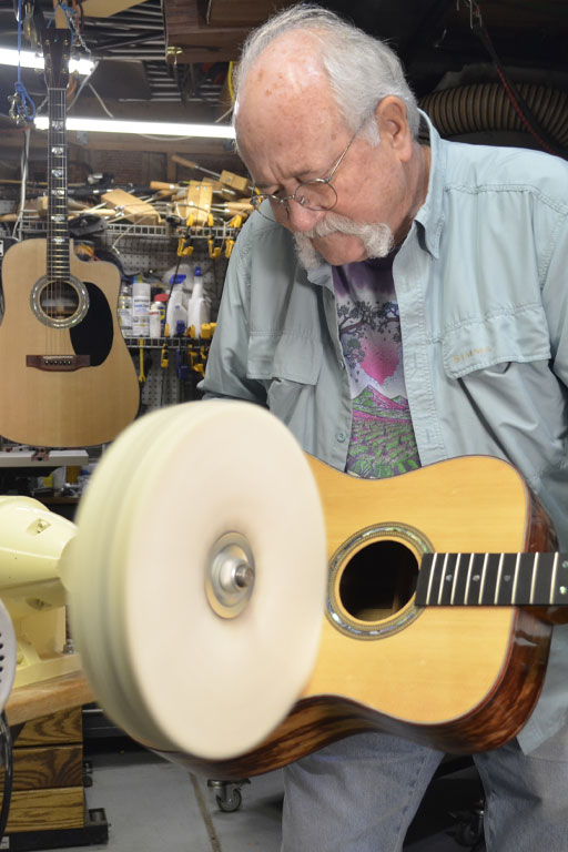 Steve Ward Buffs Guitar