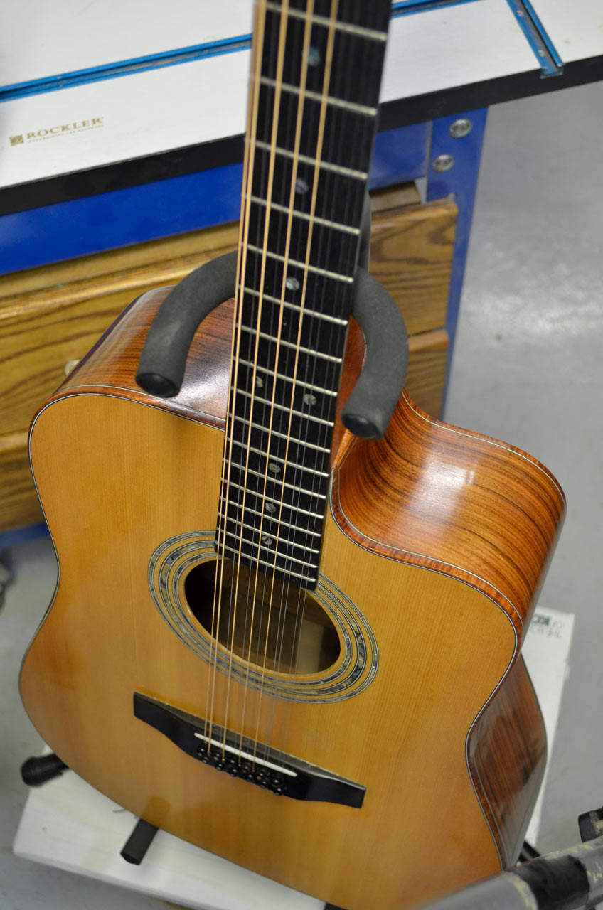 Steve Ward Buffs Guitar