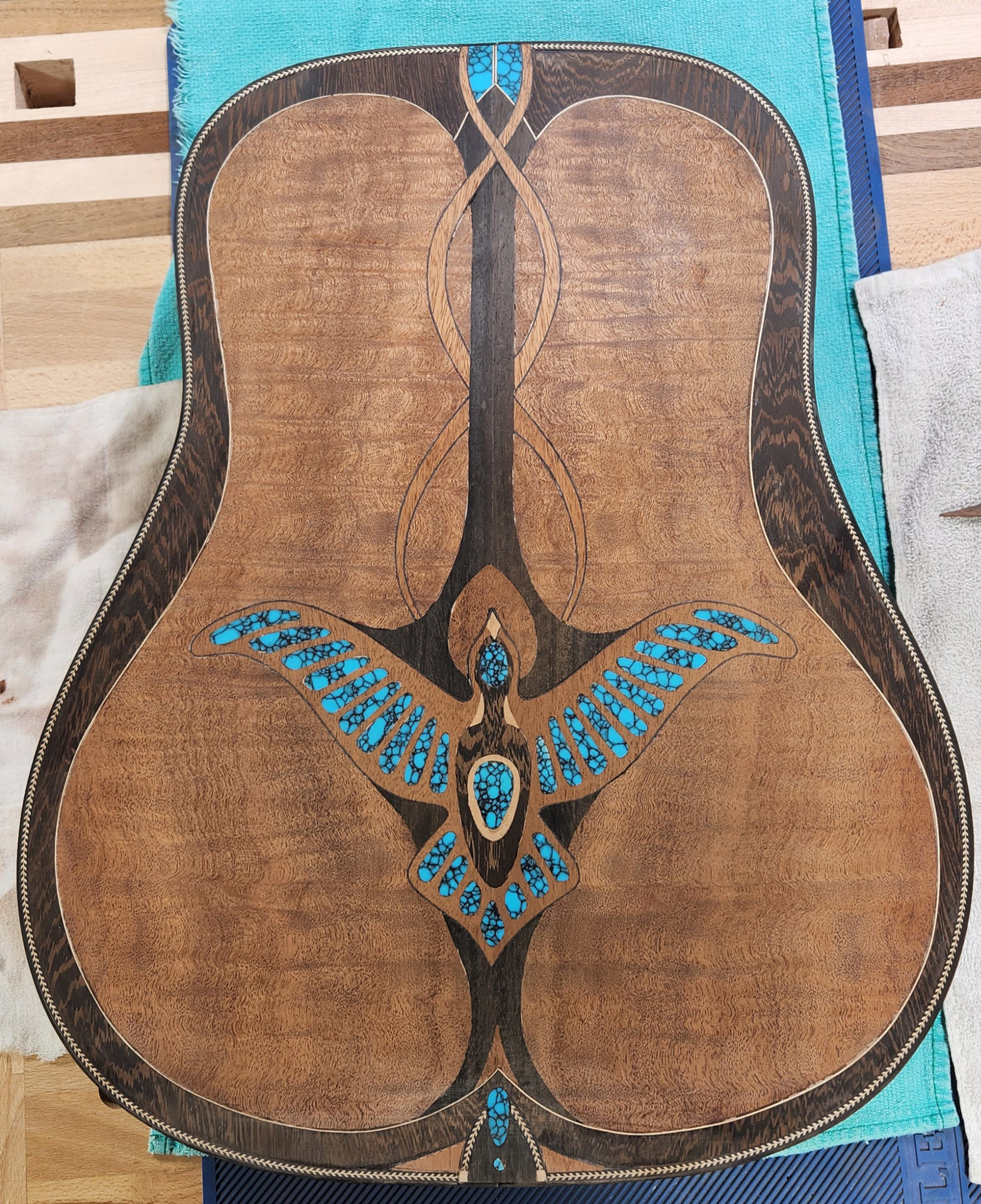 Steve Ward Buffs Guitar