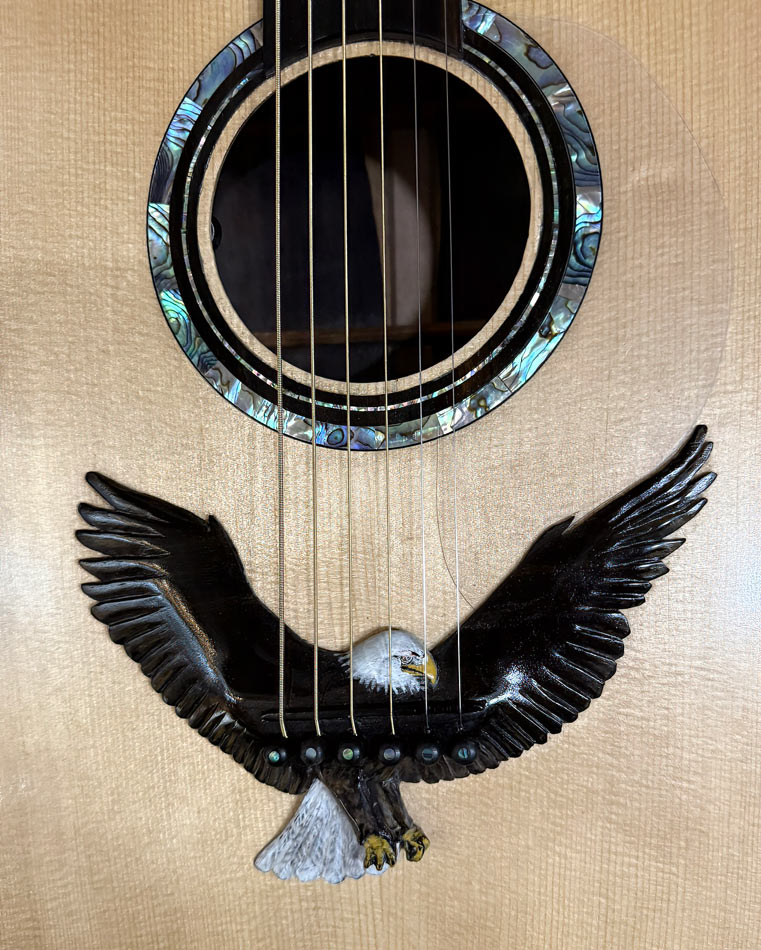 Steve Ward Buffs Guitar