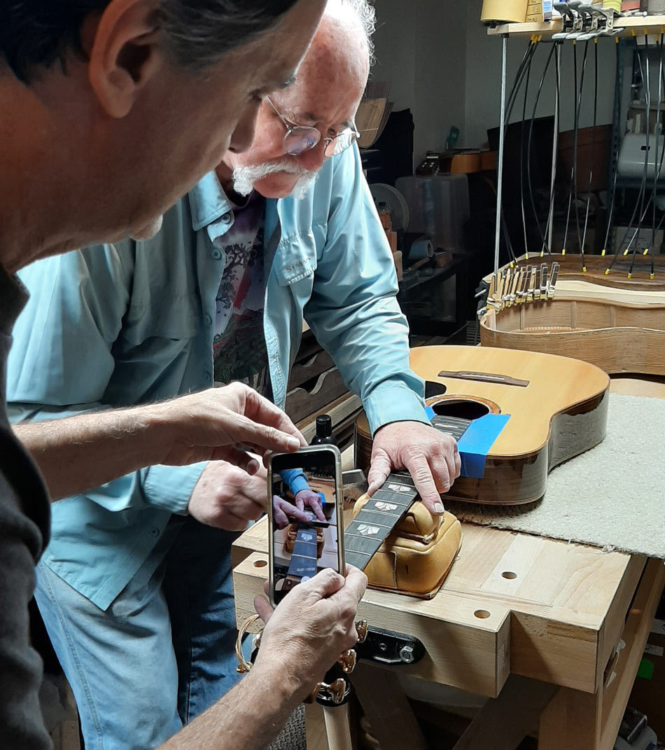 Steve Ward Buffs Guitar